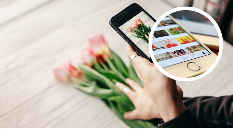 Imagem de uma pessoa tirando foto de um arranjo de flores e um círculo com uma tela do Instagram, fazendo alusão ao tema do artigo como divulgar seu negócio no Instagram